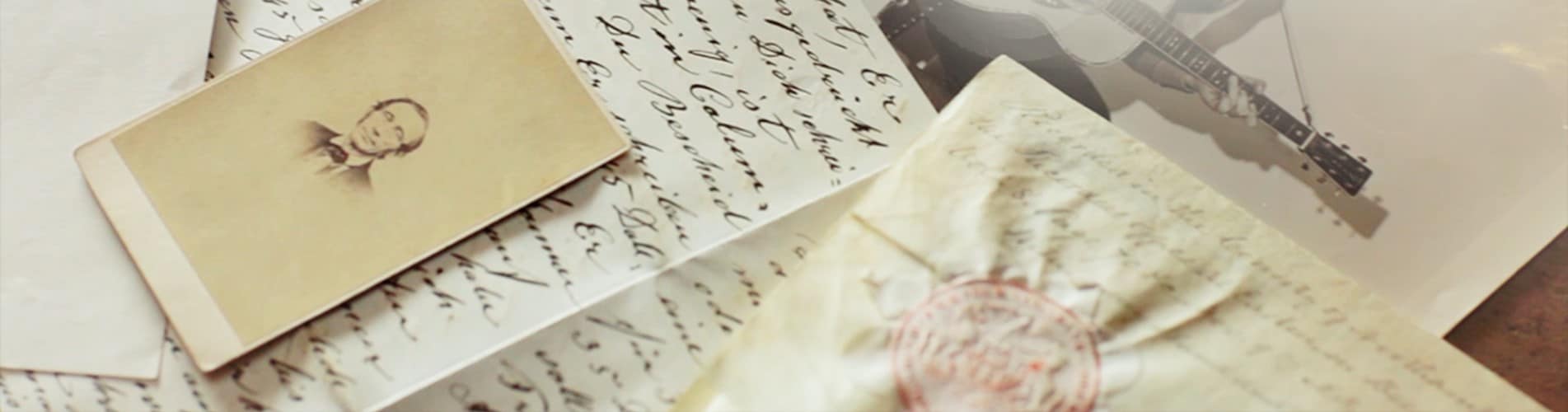 hand written note with photos of man playing guitar 