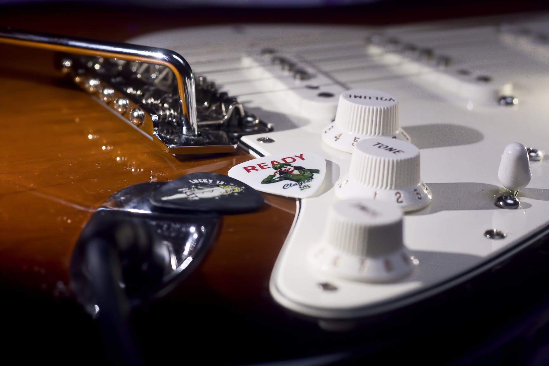 an electric guitar with an output jack