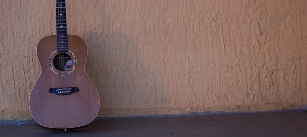 Who invented the acoustic guitar?