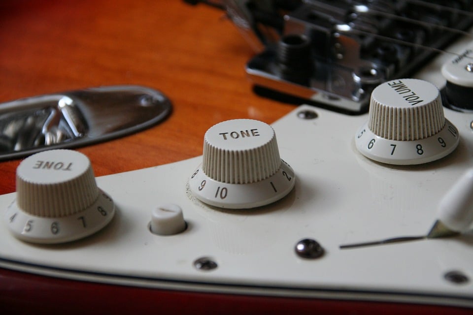 volume or tone controls of an electric guitar